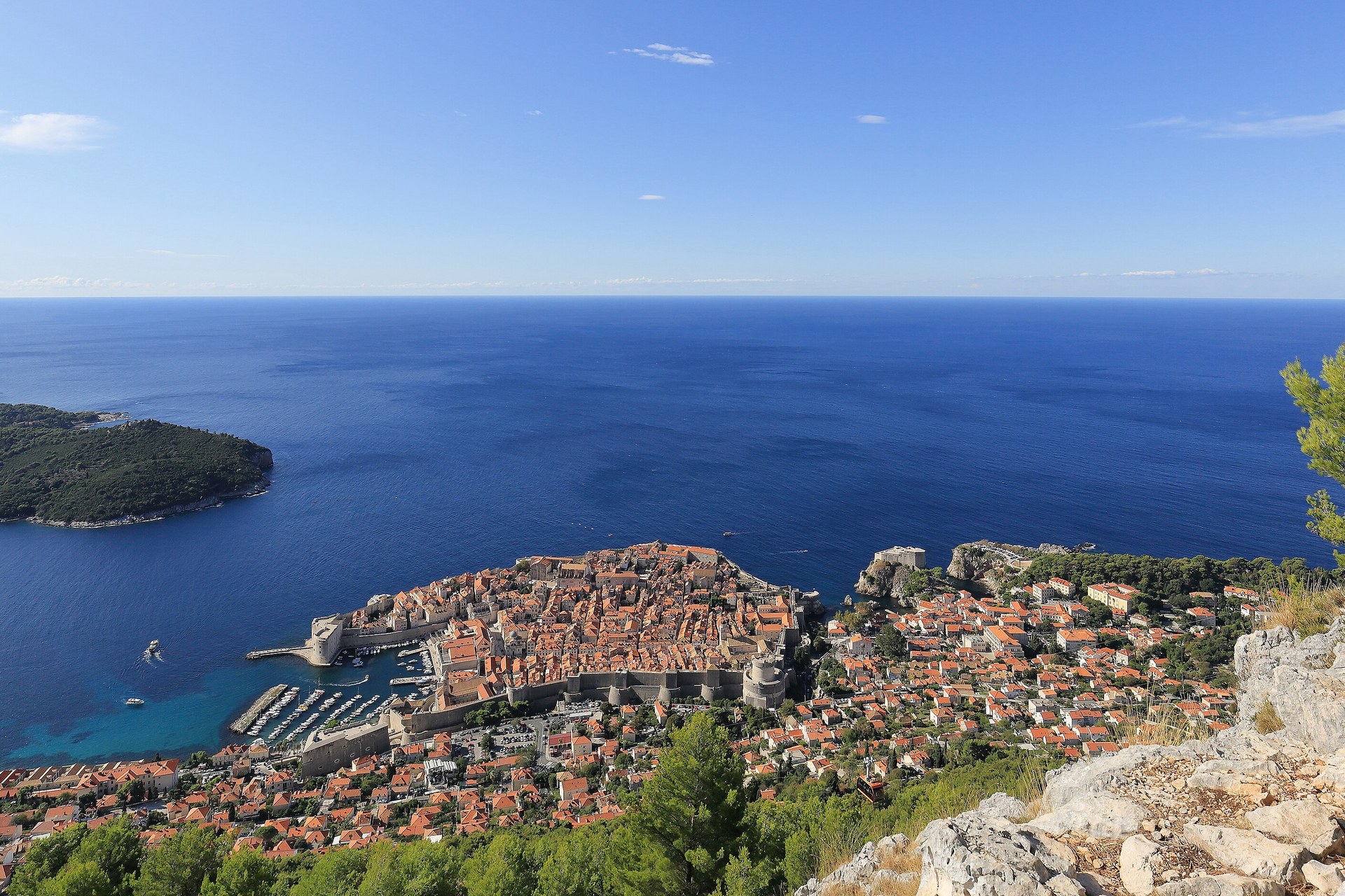 Rental car on the Adriatic coastal road above Dubrovnik old town, Croatia