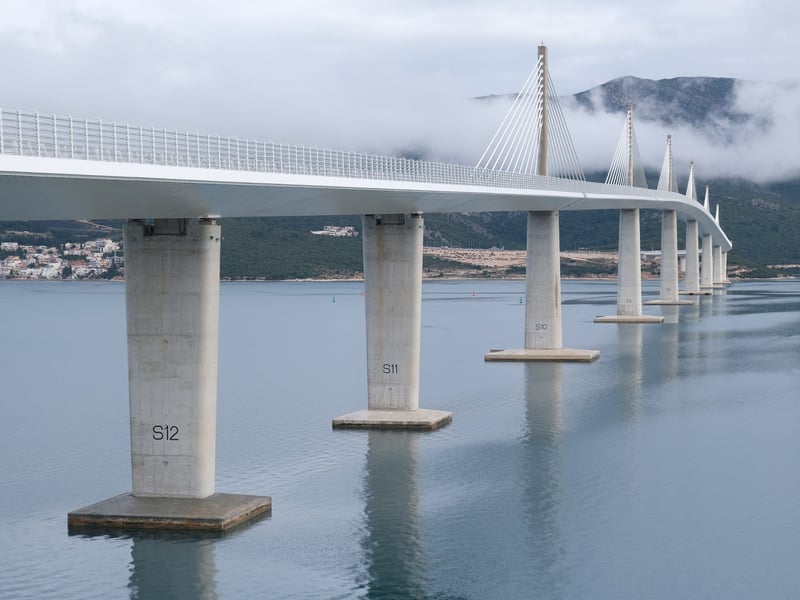 The Pelješac Bridge on its concrete piers across Mali Ston Bay, the road north from Dubrovnik to Split