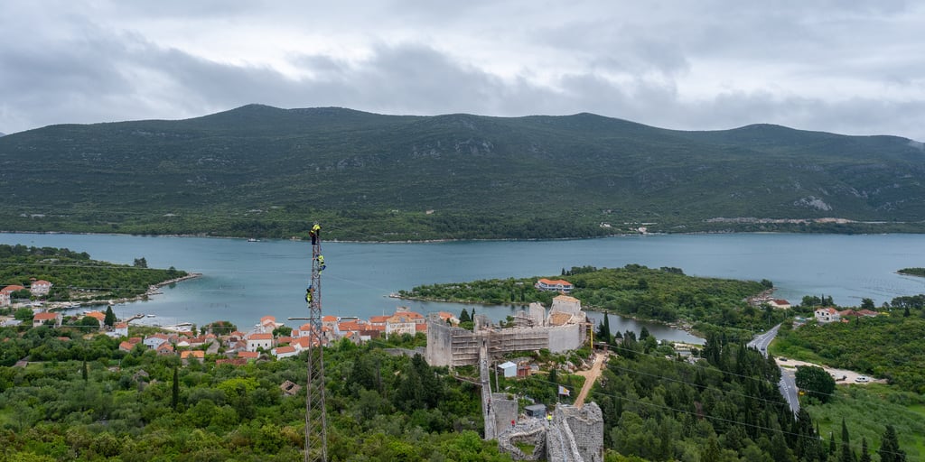 The Walls of Ston climbing the hill above Ston, with Mali Ston and its bay behind