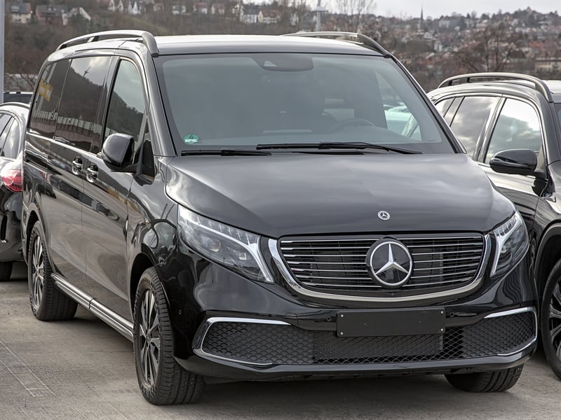 A black Mercedes-Benz V-Class people carrier, the model of our premium minivan